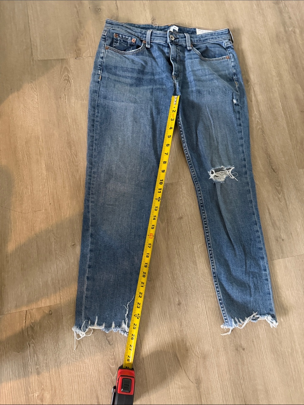 rag & bone mid-blue boyfriend jeans with distressed hem